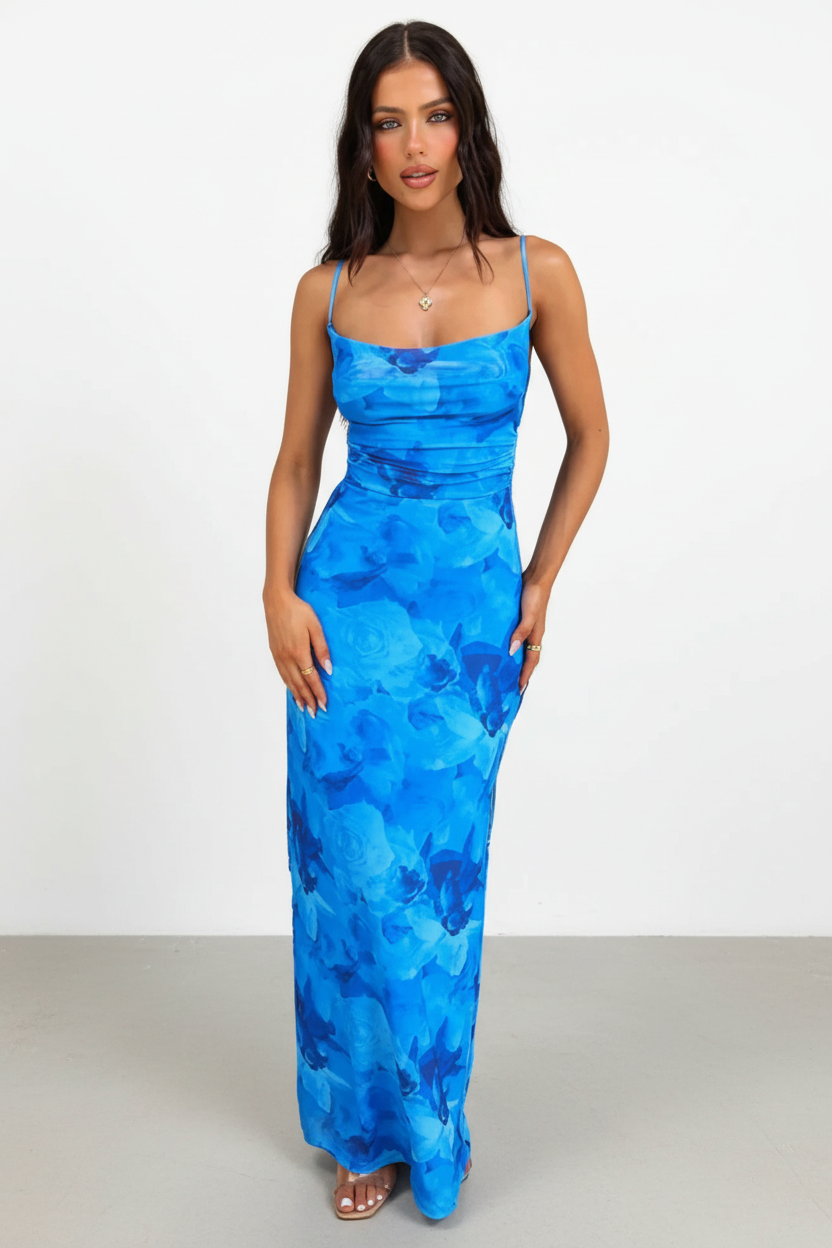 Model wearing the sapphire bloom elegance dress from Isadora London