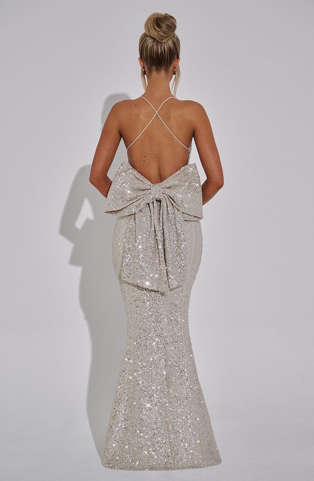 Back view of the Champagne Glow Maxi Dress – flattering silhouette with spaghetti straps, perfect for party season by Isadora London.