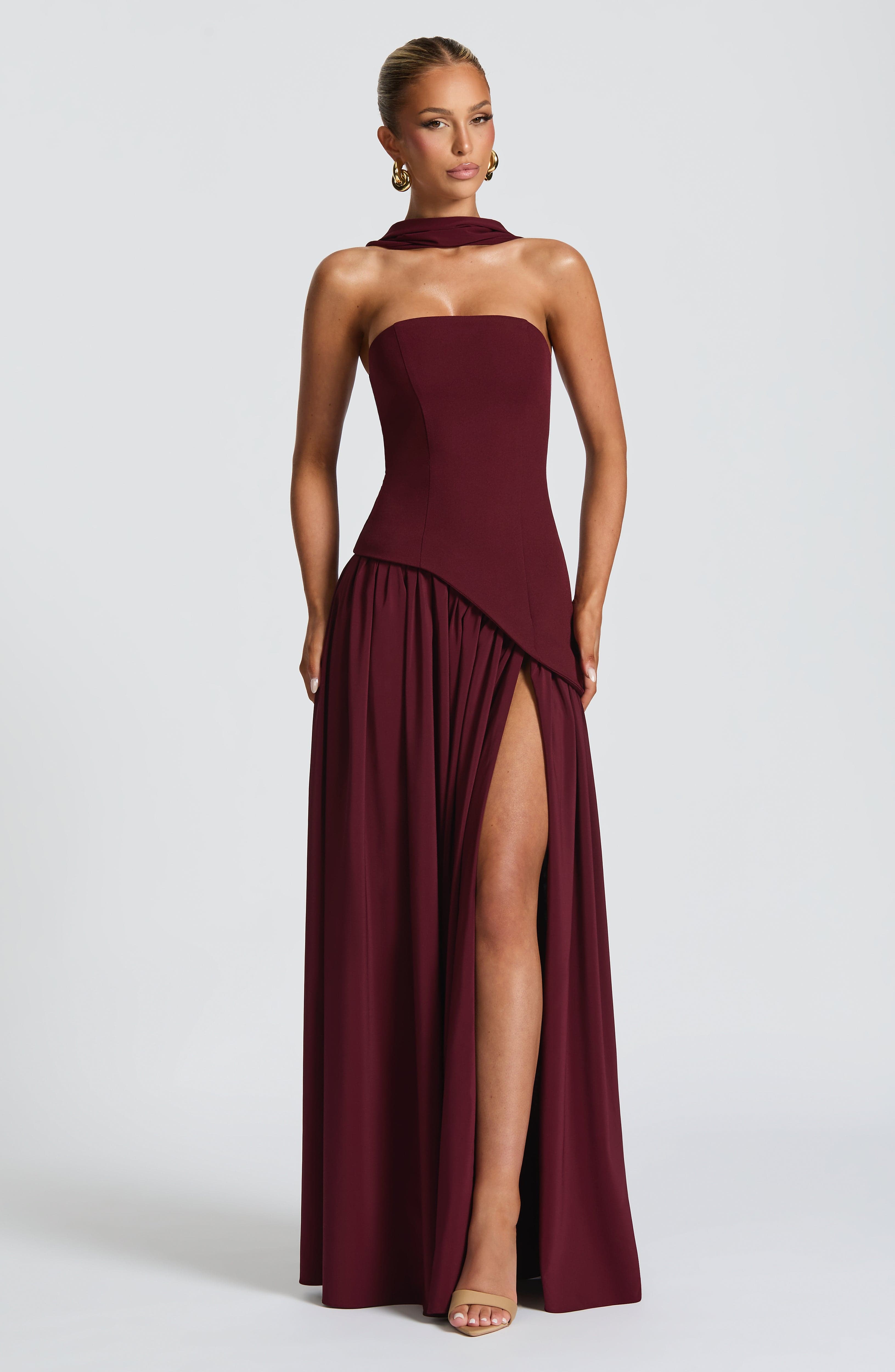 Cherry Lacquer Chic Slit Maxi Dress – Modern strapless formal dress with high slit, perfect for weddings and black-tie events