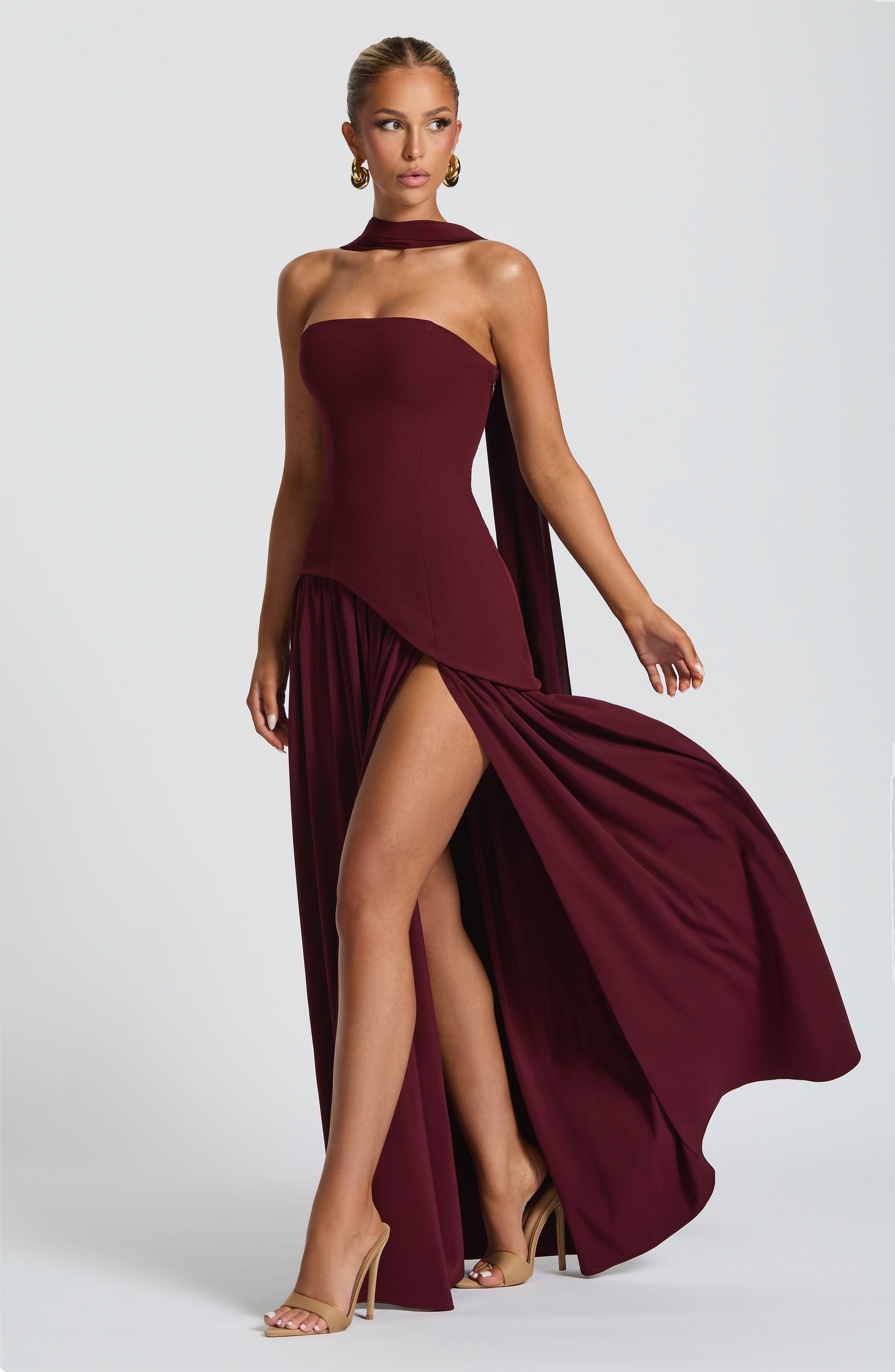 Cherry Lacquer Chic Slit Maxi Dress – Modern strapless formal dress with high slit, perfect for weddings and black-tie events
