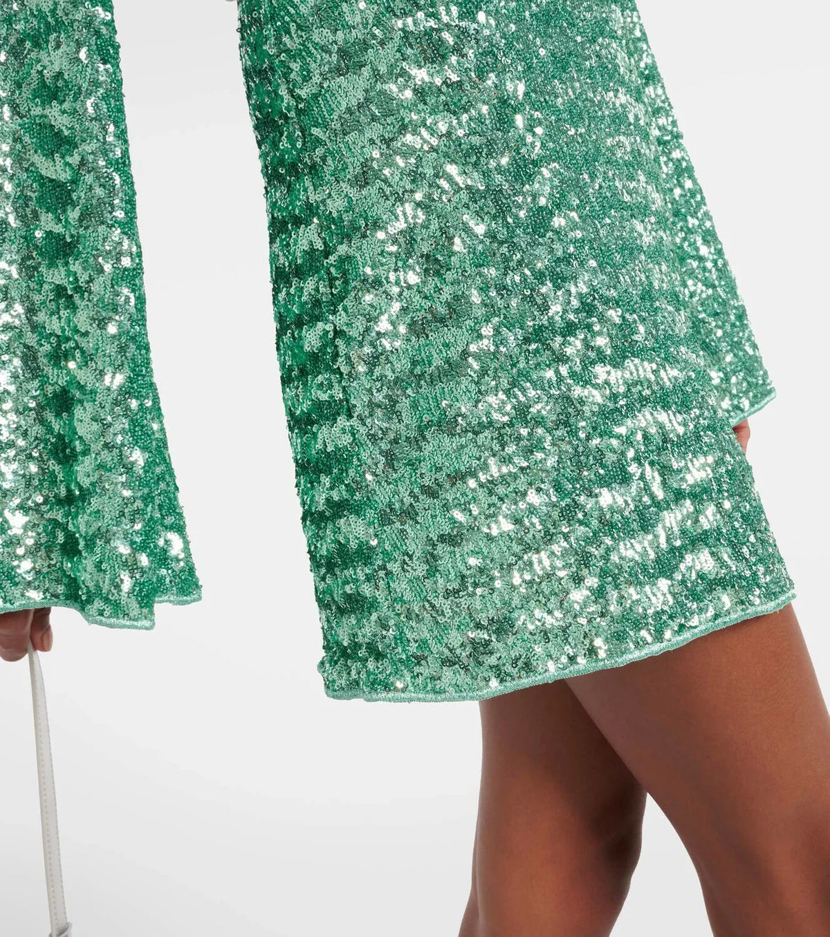Sparkling green sequin mini dress with V-neck and long sleeves – holiday party outfit from Isadora London.