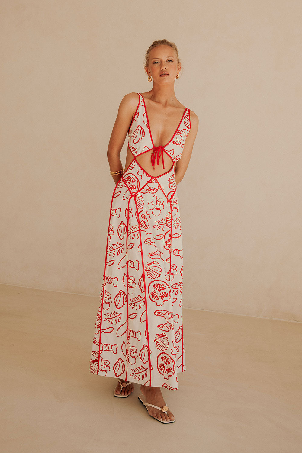 Ophelia Maxi Dress in red marine print by Isadora London – sleeveless cut-out summer maxi, perfect for holidays and beach getaways.