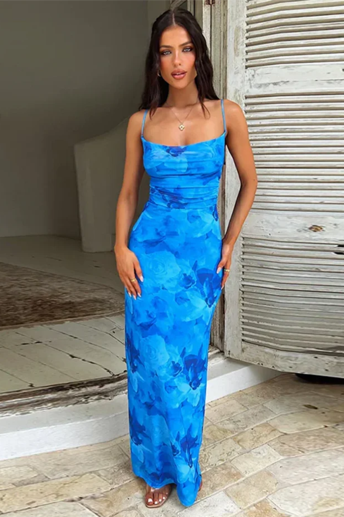 Model wearing the sapphire bloom elegance dress from Isadora London