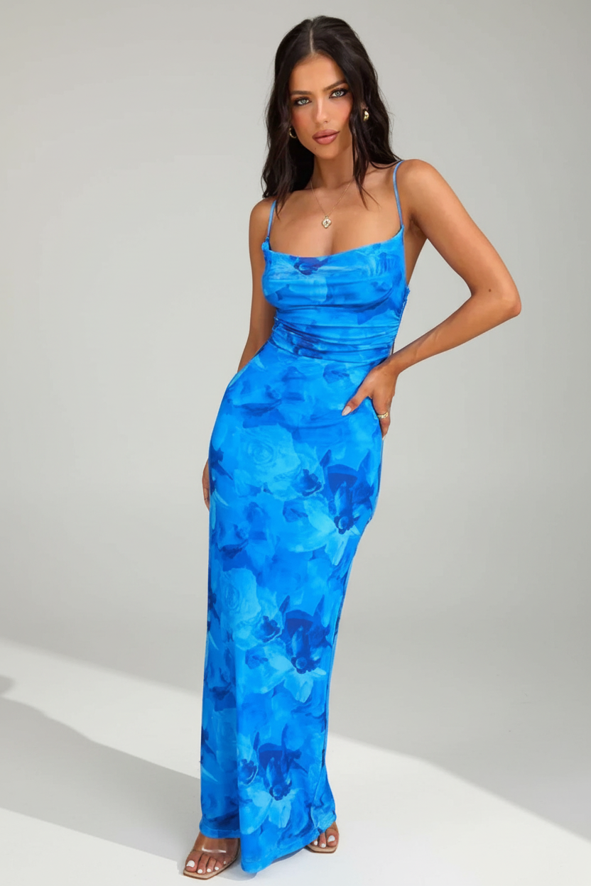 Model wearing the sapphire bloom elegance dress from Isadora London