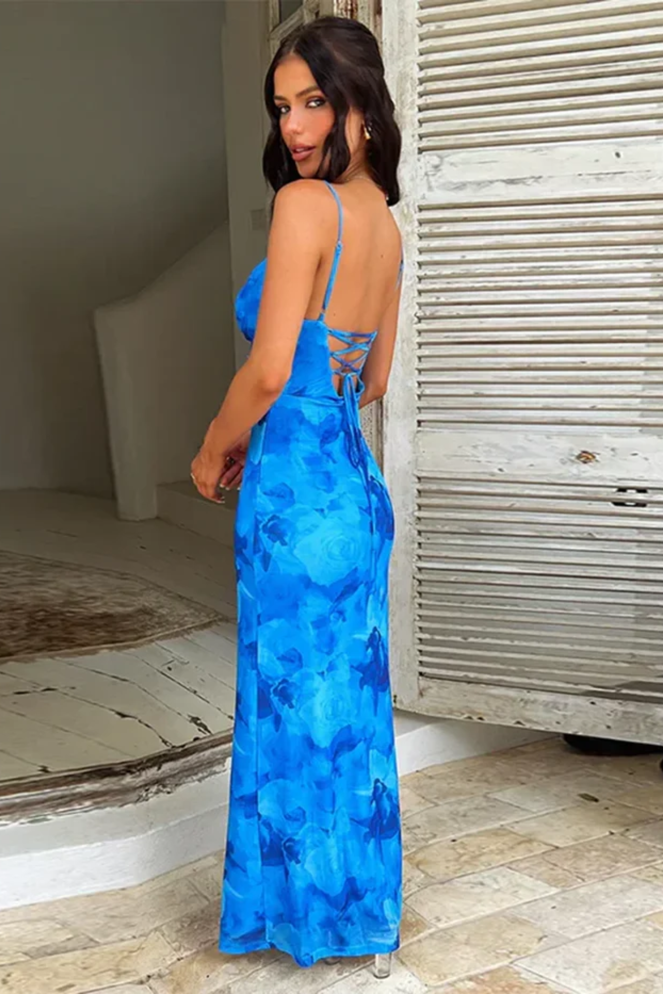 Model wearing the sapphire bloom elegance dress from Isadora London