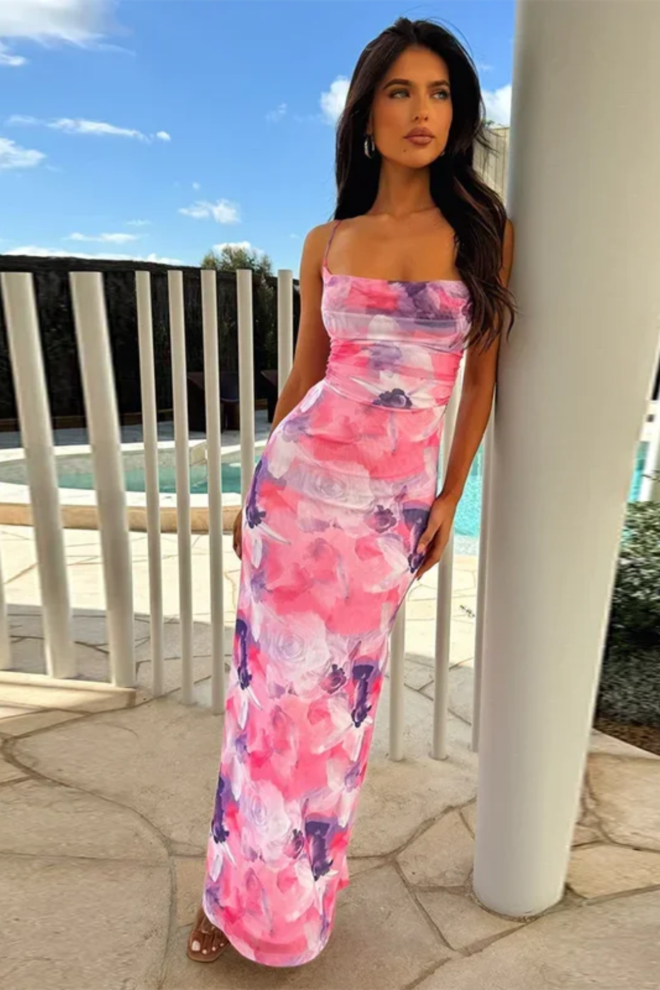 Model wearing the sapphire bloom elegance dress from Isadora London