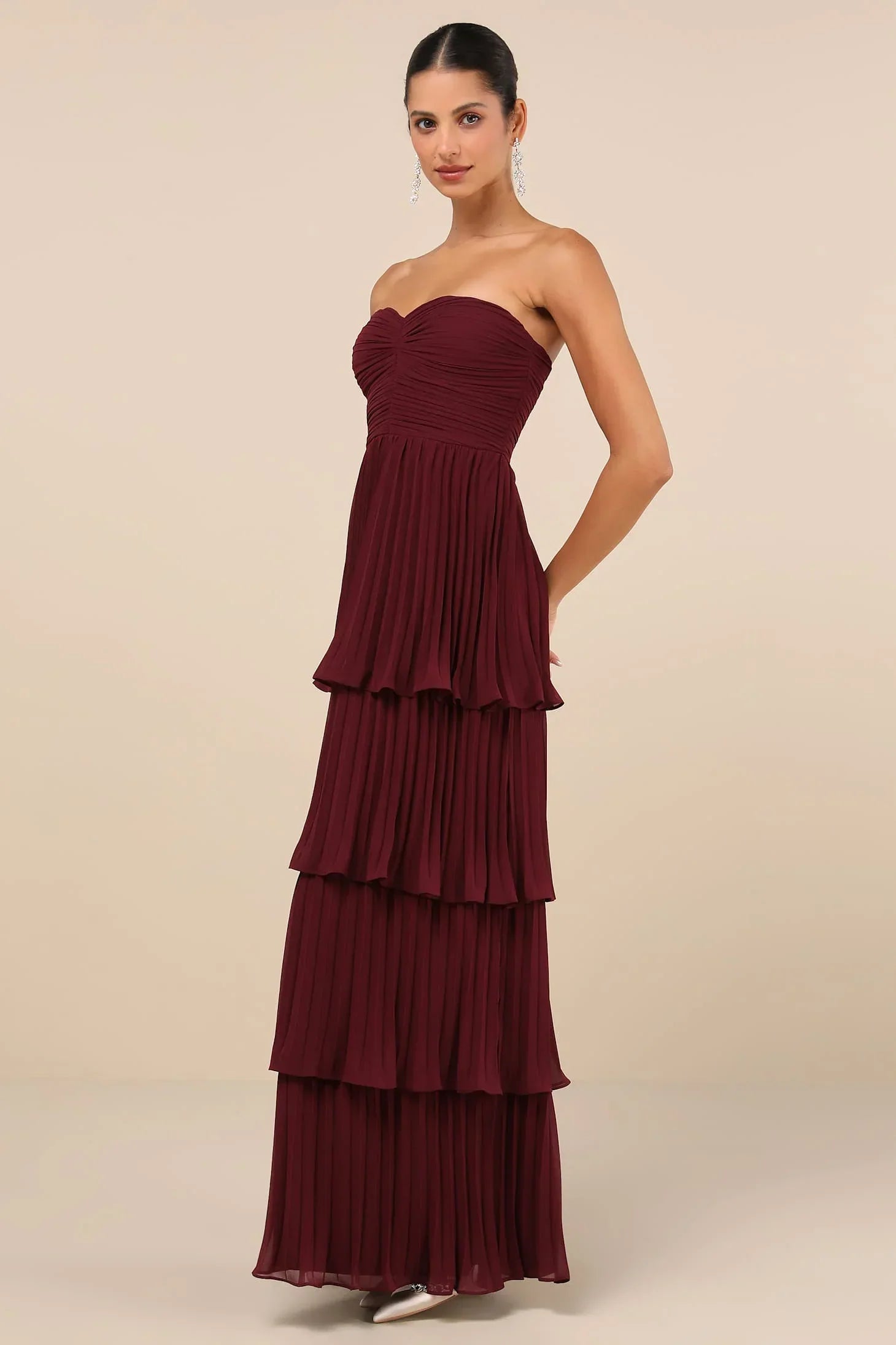Side view burgundy strapless tiered maxi gown for elegant wedding guest look – Isadora London