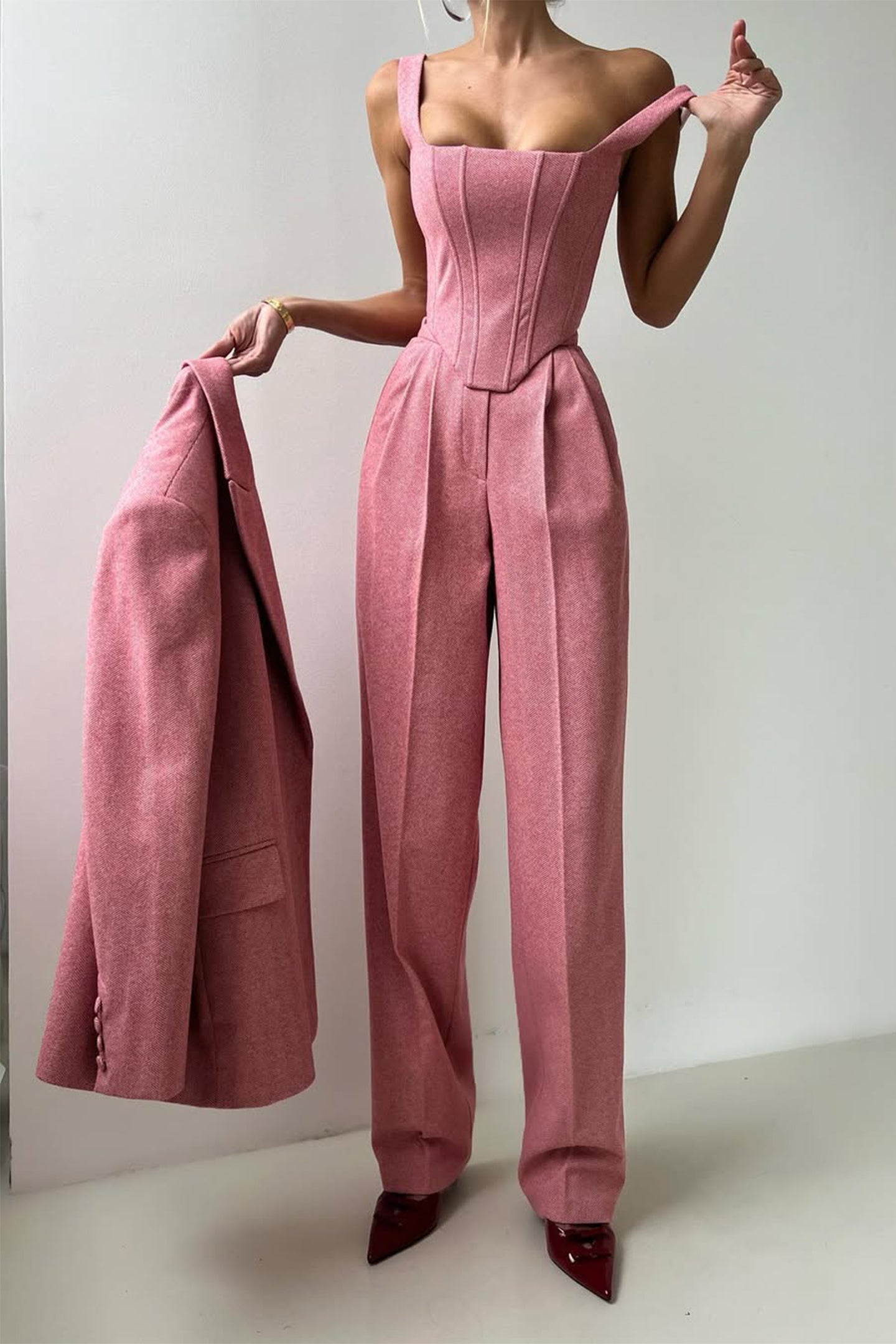 Pink blazer set by Isadora London – chic tailored look with matching corset bustier and trousers.
