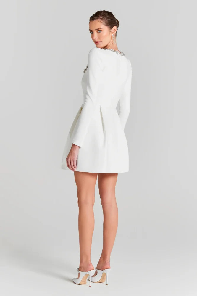 White velvet mini dress – long sleeves, square neck, side/back view; Isadora London.