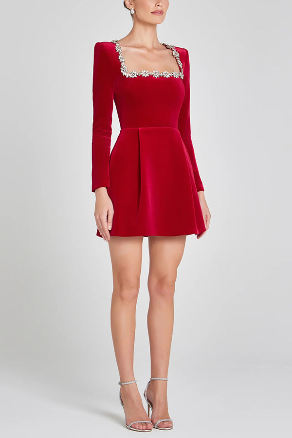 Red velvet mini dress – embellished neckline, long sleeves, mini length; Isadora London.